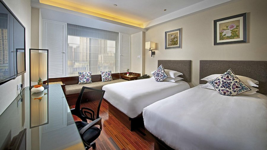 Habitación con dos camas del SSAW Boutique Hotel Shanghai Hongkou